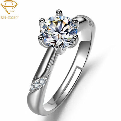 女性のための銀製のダイヤモンドの結婚指輪の彫版を置くことを舗装しなさい